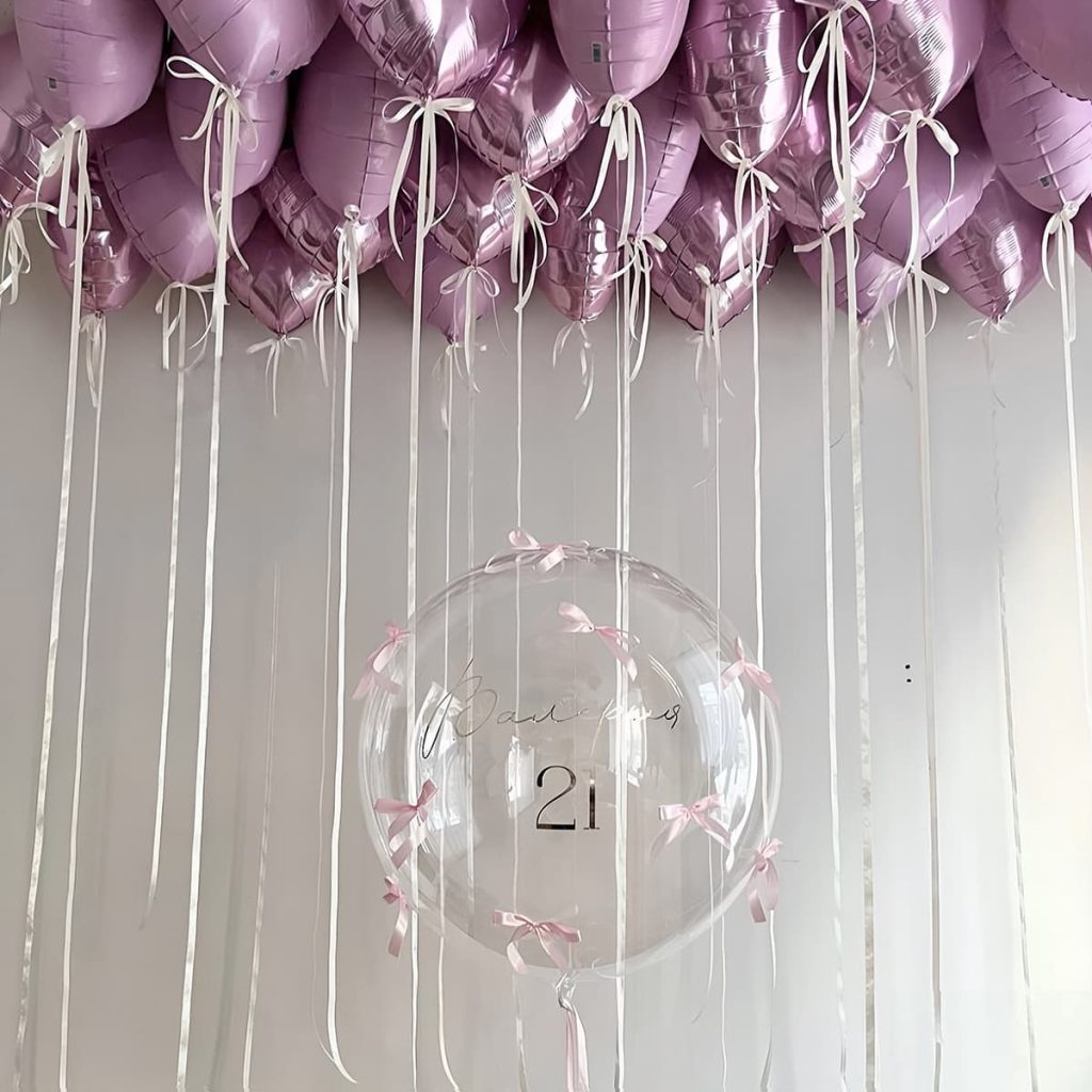 Ніжні гелієві кульки-сердечка з бантиками та прозора куля